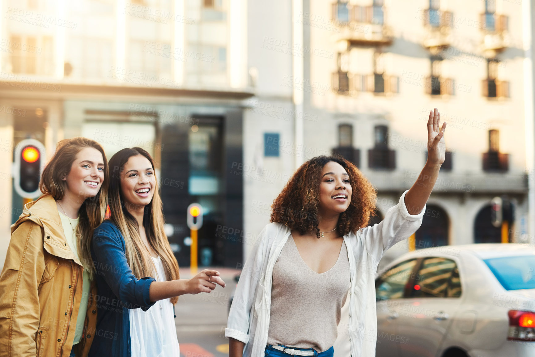 Buy stock photo Cropped shot of three friends having fun in the city