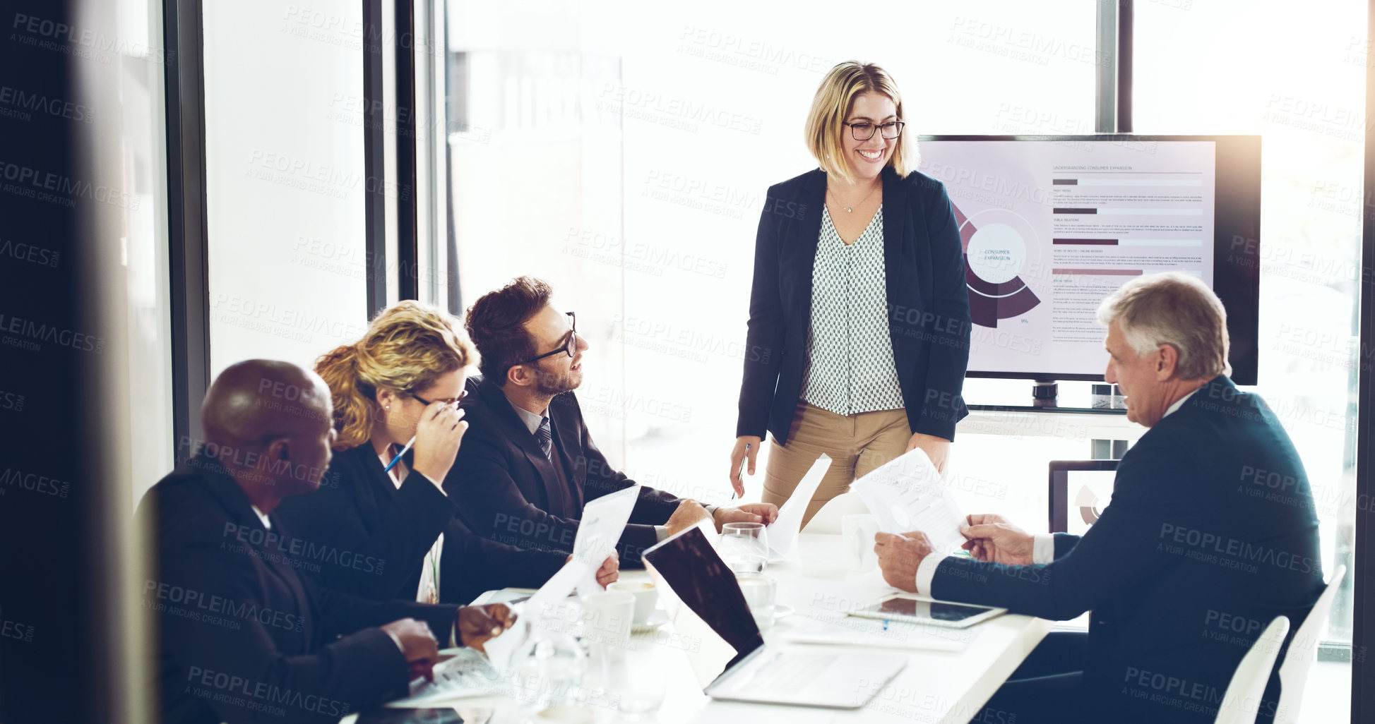 Buy stock photo Cropped shot of an attractive young businesswoman giving a presentation in the boardroom