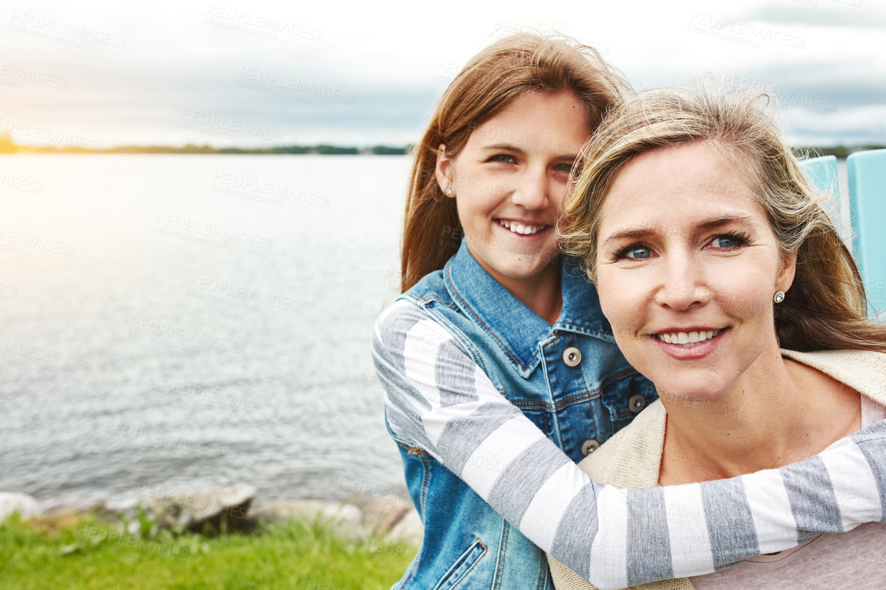 Buy stock photo Shot of a mother and her daughter bonding outdoors