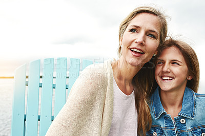 Buy stock photo Shot of a mother and her daughter bonding outdoors