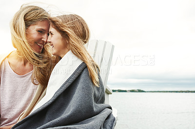 Buy stock photo Shot of a mother and her daughter bonding outdoors