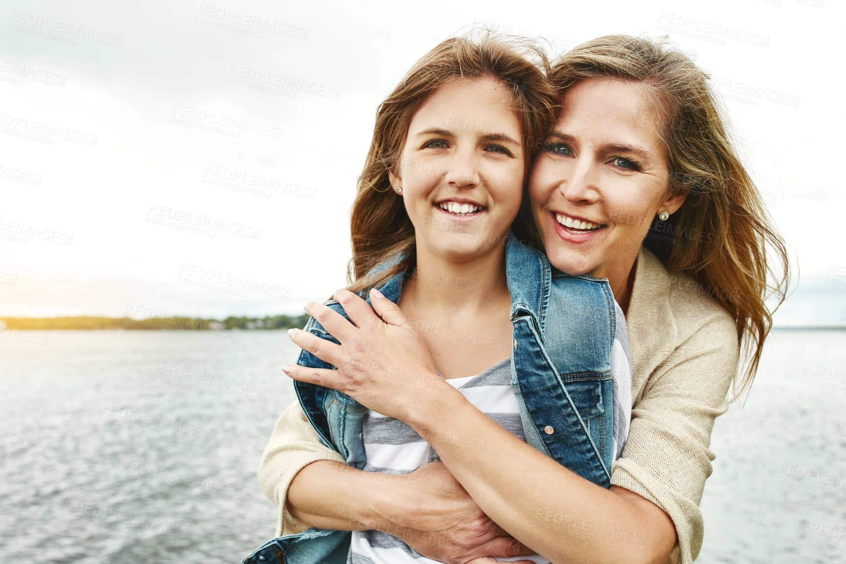 Buy stock photo Portrait of a mother and her daughter bonding outdoors