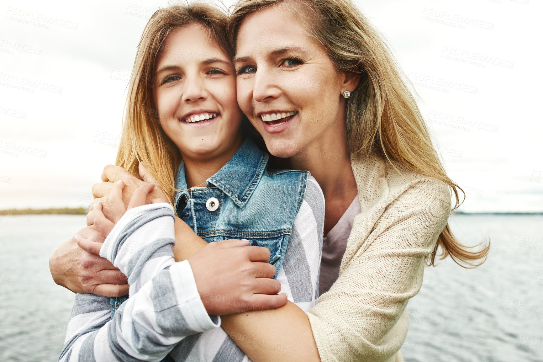 Buy stock photo Portrait of a mother and her daughter bonding outdoors