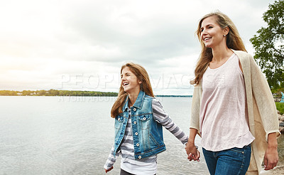 Buy stock photo Holding hands, lake or smile with mother and daughter outdoor in nature together for bonding. Family, love or summer with happy woman and girl child walking in park for security, support or trust