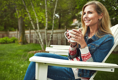 Buy stock photo Coffee, smile and woman relaxing in backyard for calm, peace and break on weekend tea. Nature, happy and mature female person on chair drinking cappuccino, latte or espresso in garden at home.