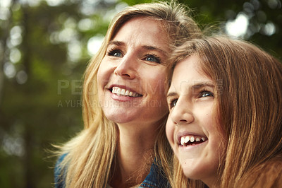 Buy stock photo A happy mother and daughter spending time together outdoors