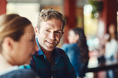 Buy stock photo Shot of people enjoying a drink at a bar