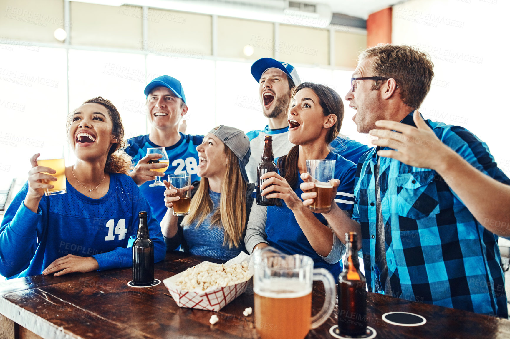 Buy stock photo Sports, fans and friends in pub with solidarity, television and beer at broadcast of world cup together. Baseball, games and group of excited people in bar for watch party, drinks and team support