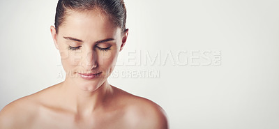 Buy stock photo Woman, skincare and calm in studio for beauty with soft, smooth and clear skin with wellness. Girl, isolated and white background for cosmetics or dermatology, self care and happiness with mockup