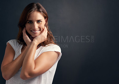Buy stock photo Happy woman, portrait and relax with natural beauty for haircare, style or grooming on a dark studio background. Female person or brunette model in satisfaction for hair shine or glow on mockup space