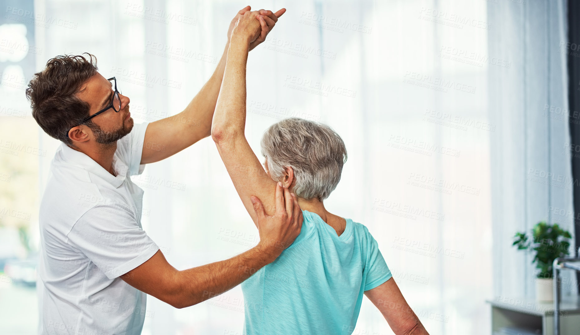Buy stock photo Physiotherapy, arm or old woman in clinic with stretching, mobility or checkup in rehabilitation. Healthcare, elderly patient or chiropractor with space, shoulder pain or joint recovery in physio.