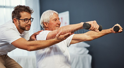 Buy stock photo Cropped shot of a senior man working on his recovery with a male physiotherapist