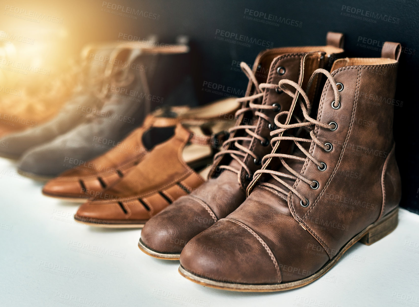 Buy stock photo Shot of a selection of shoes lined up together
