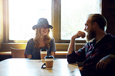 Buy stock photo Cropped shot of a hipster couple in a coffee shop