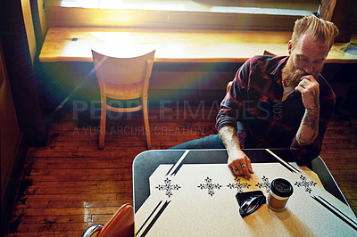 Buy stock photo Cropped shot of a male hipster in a coffee shop