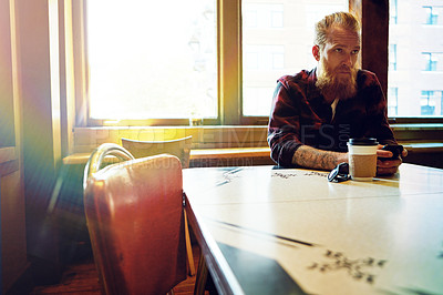 Buy stock photo Cropped shot of a male hipster in a coffee shop