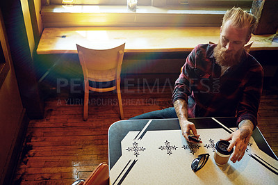 Buy stock photo Cropped shot of a male hipster in a coffee shop