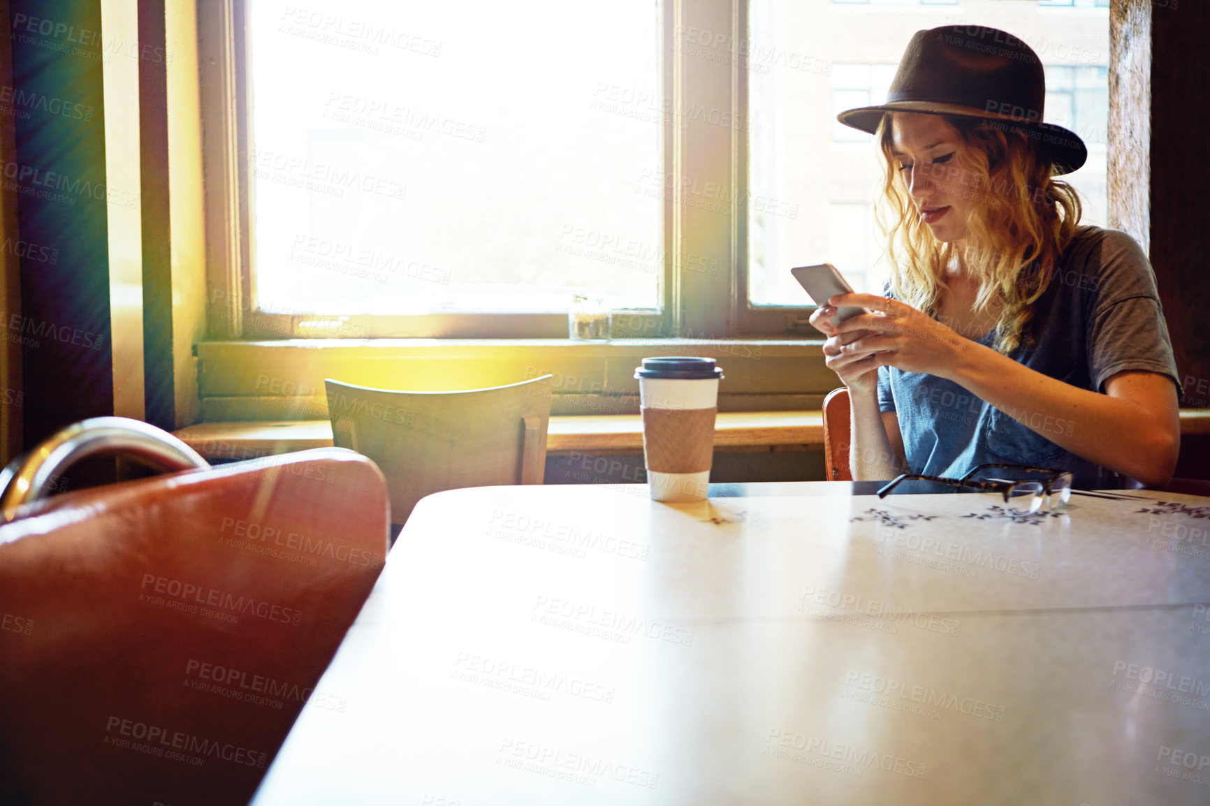 Buy stock photo Cropped shot of a female hipster in a coffee shop