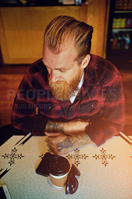 Buy stock photo Cropped shot of a male hipster in a coffee shop