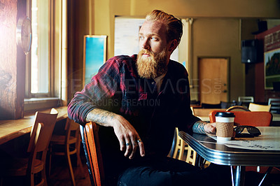 Buy stock photo Cropped shot of a male hipster in a coffee shop