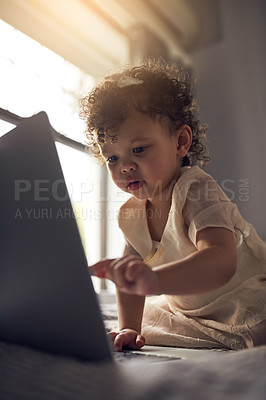 Buy stock photo Girl, toddler and laptop on bed with computer for curiosity, development games or e learning in bedroom. Lens flare, online and child with technology for entertainment, education or internet in home