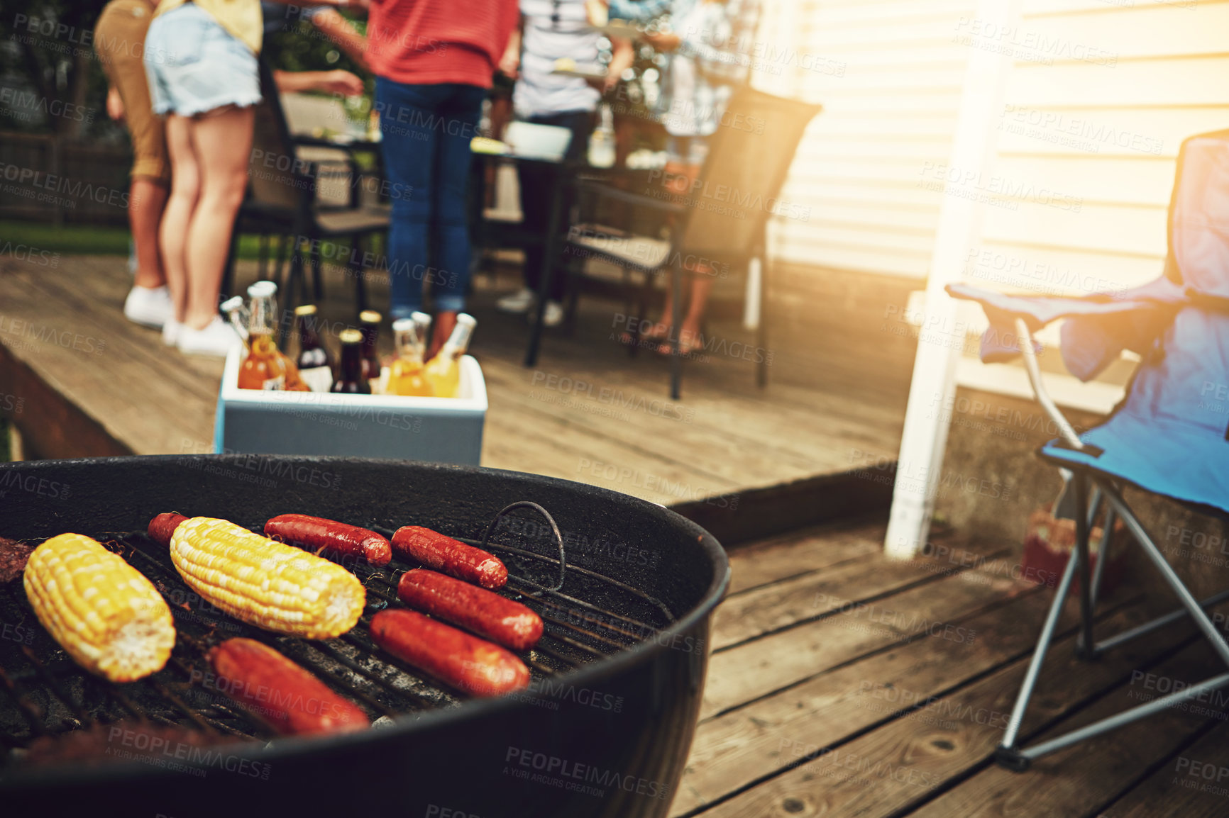 Buy stock photo Outdoor, grill and meat for barbecue, meal and party for gathering in weekend, break and reunion. Backyard, people and friends together with food, enjoy and cooking for celebration, lunch and drinks