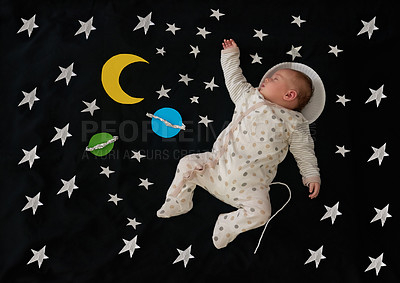 Buy stock photo Conceptual shot of a baby girl as an astronaut against a space background