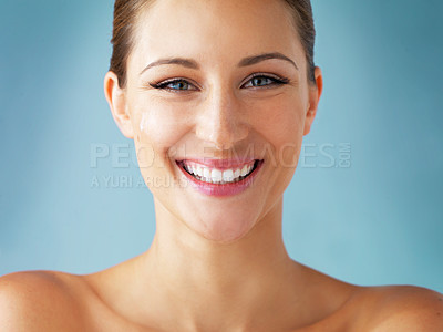 Buy stock photo Skin care, cosmetics and smile, portrait of woman with dermatology and makeup on blue background. Happiness, skincare and wellness, happy face of model with beauty and facial glow on studio backdrop.