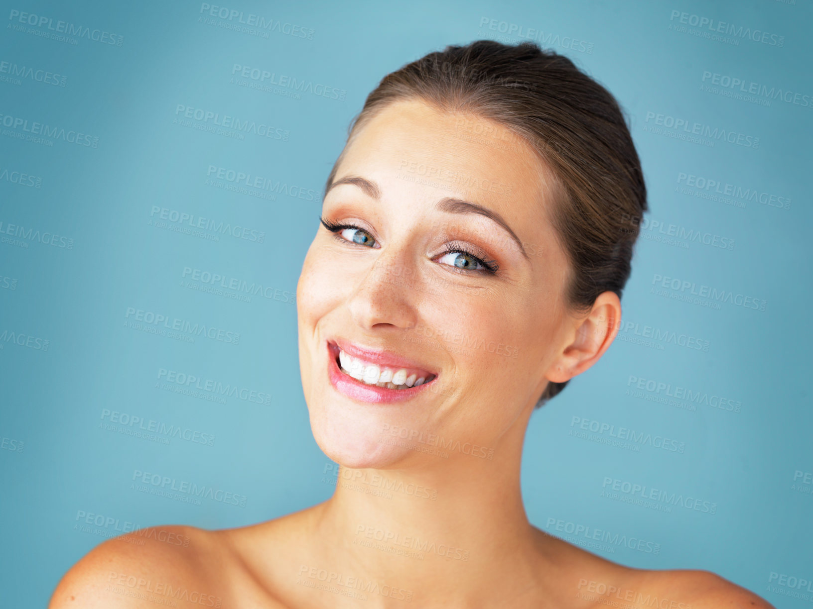 Buy stock photo Woman, happy portrait and skincare for beauty with natural makeup, microblading and glow in studio. Female person, face smile and dermatology for shine, spa aesthetic and wellness by blue background