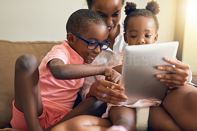 Buy stock photo Mother, children and relax on couch with tablet for screen time, online storytelling and apps for growth or development. Mom, siblings and home with internet for entertainment, games and streaming.