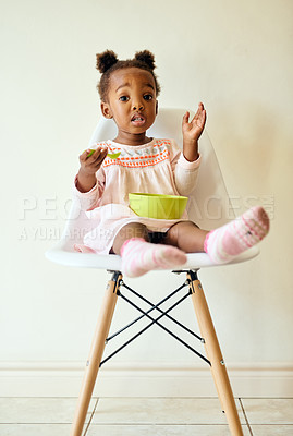 Buy stock photo Full length portrait of an adorable little girl eating breakfast at home