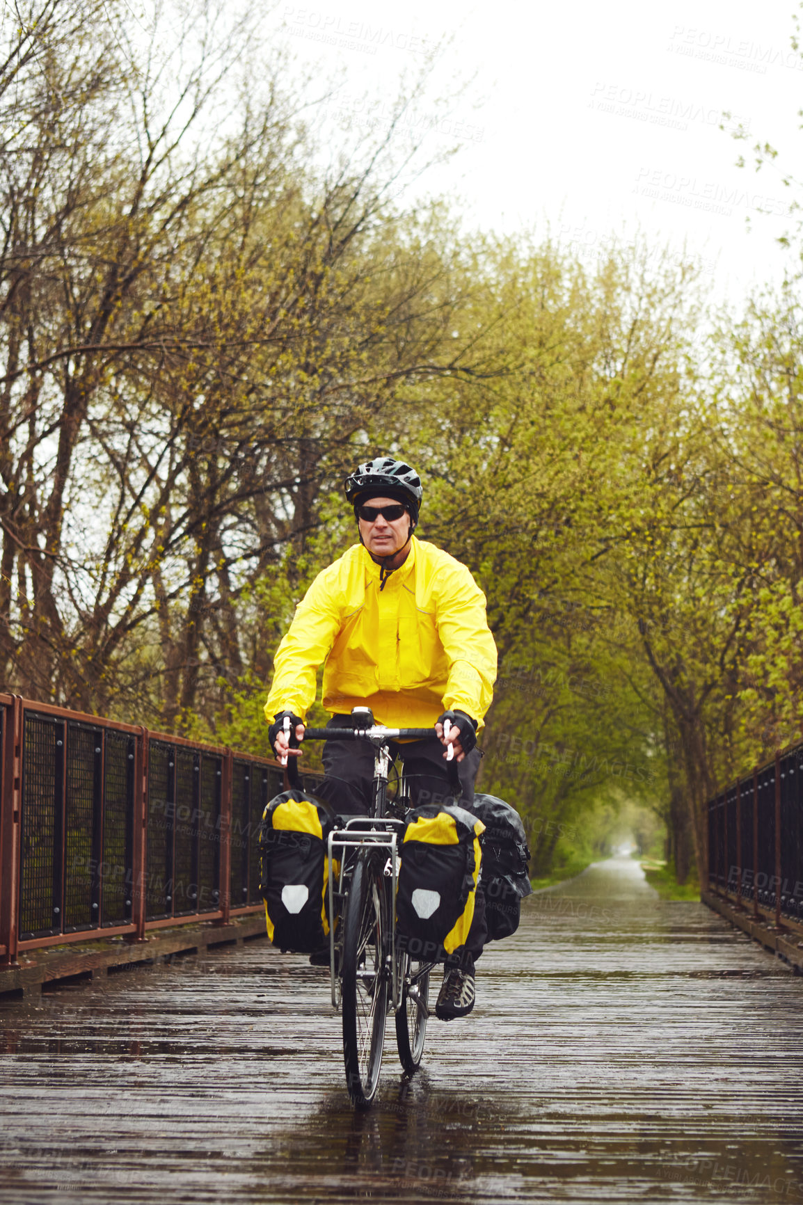 Buy stock photo Bridge, man or bike with sunglasses for fitness, cycling adventure or cross country trip for workout. Outdoor, backpacking journey or mature cyclist with winter training, sports gear or performance