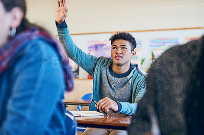 Buy stock photo Cropped shot of a young man raising his hand in class