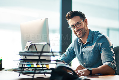 Buy stock photo Confident, relaxed and happy professional manager or HR assistant working on a computer in a modern office. Smiling, proud male typing and responding to emails, booking and managing appointments