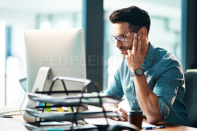 Buy stock photo Serious, business man and computer in office for planning startup, online research and reading email report at desk. Focused worker, desktop pc and website connection for project, internet and tech