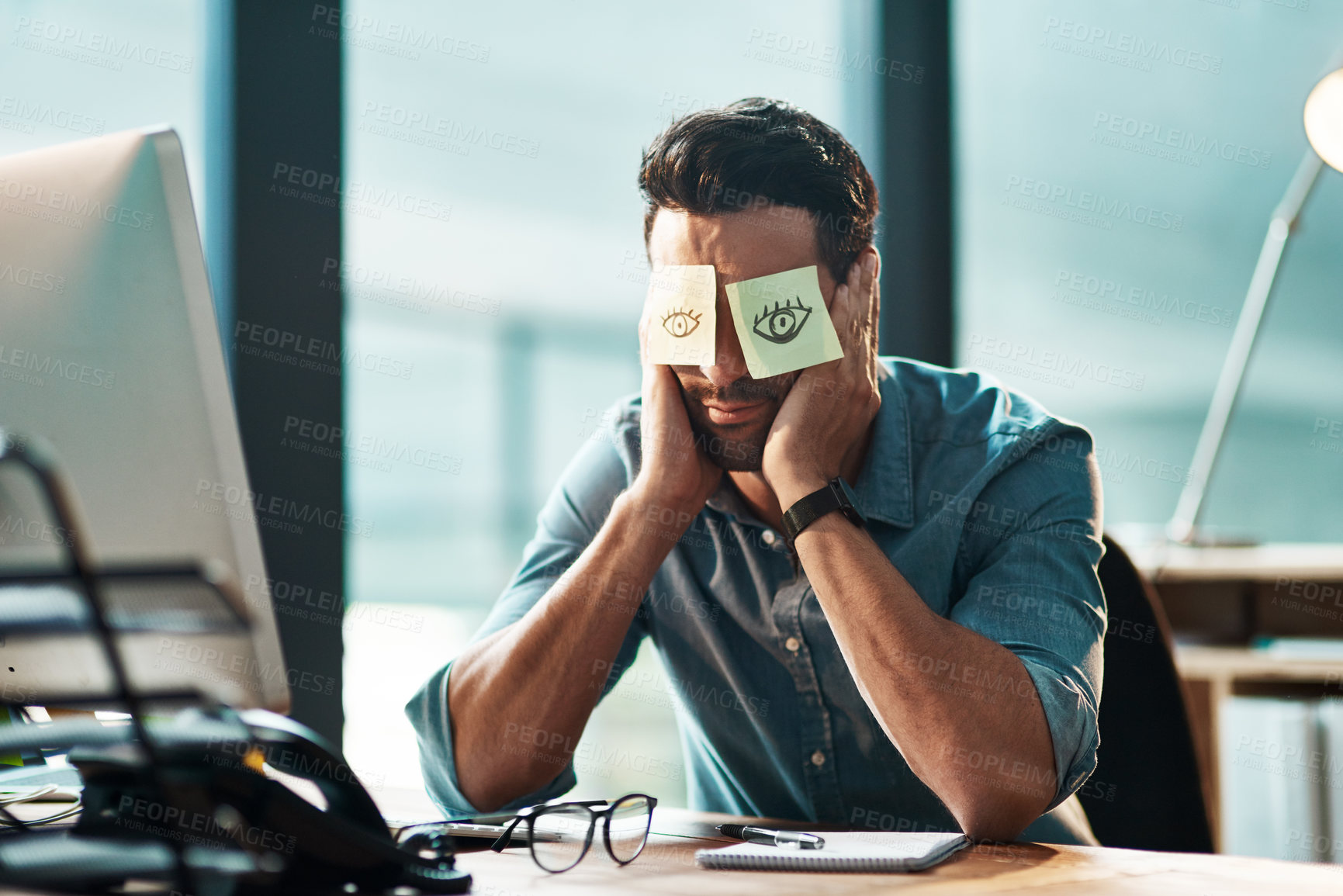 Buy stock photo Tired, sleeping and a man with sticky note on face during overtime, late work and business at night. Fatigue, burnout and a businessman with paper to cover eyes during sleep at a desk for a deadline