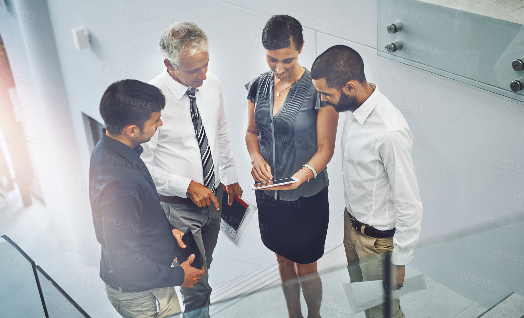 Buy stock photo Business people, above or tablet for teamwork, meeting and collaboration in office for review. Planning, online and discussion for feedback, news and project research in partnership for sharing ideas