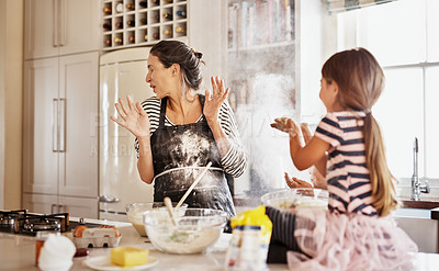 Buy stock photo Mother, playing or girl baking in kitchen as a happy family with a playful young kid with flour at home. Dirty, messy or funny mom helping, cooking or teaching daughter to bake for child development 