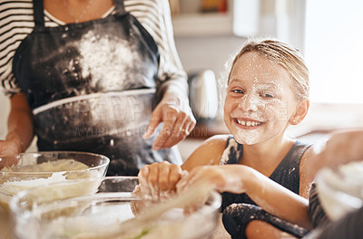 Buy stock photo Flour, playing or portrait of girl baking in kitchen with a messy young kid smiling with a dirty face at home. Smile, happy or parent cooking or teaching a fun daughter to bake for child development 