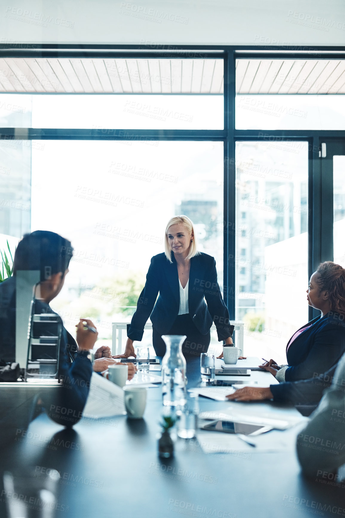 Buy stock photo Cropped shot of an attractive young businesswoman giving a presentation in the boardroom