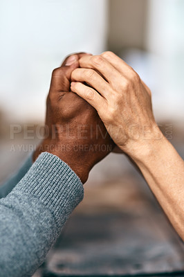 Buy stock photo Cropped shot of two unrecognizable people holding hands