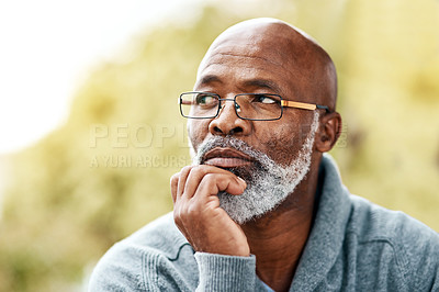 Buy stock photo senior, black man and face thinking outdoor in nature to remember memory, idea or vision. Headshot of an elderly male person think or planning future, life insurance or retirement at a park in summer