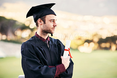 Buy stock photo Shot of a student on graduation day