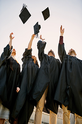 Buy stock photo Celebration, air and group with hats, graduation and proud of certificate, event and education. Outdoor, students and ceremony for people, knowledge and achievement in university and success with cap