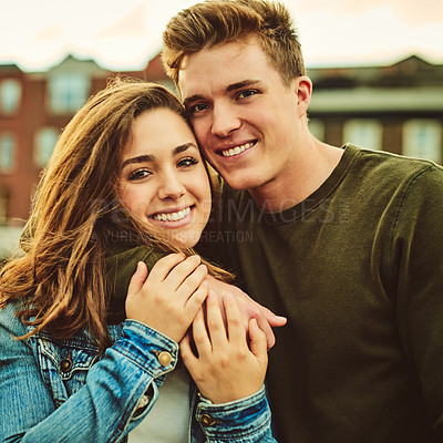 Buy stock photo Cropped shot of a loving young couple out on a date