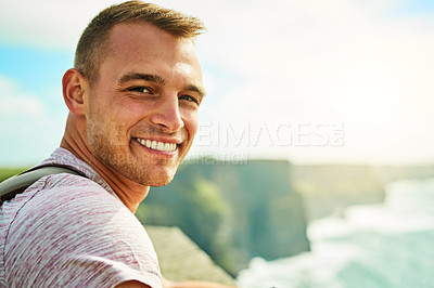 Buy stock photo Shot of a handsome man travelling outdoors