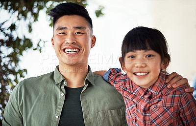 Buy stock photo Portrait of a father and his little daughter bonding together at home