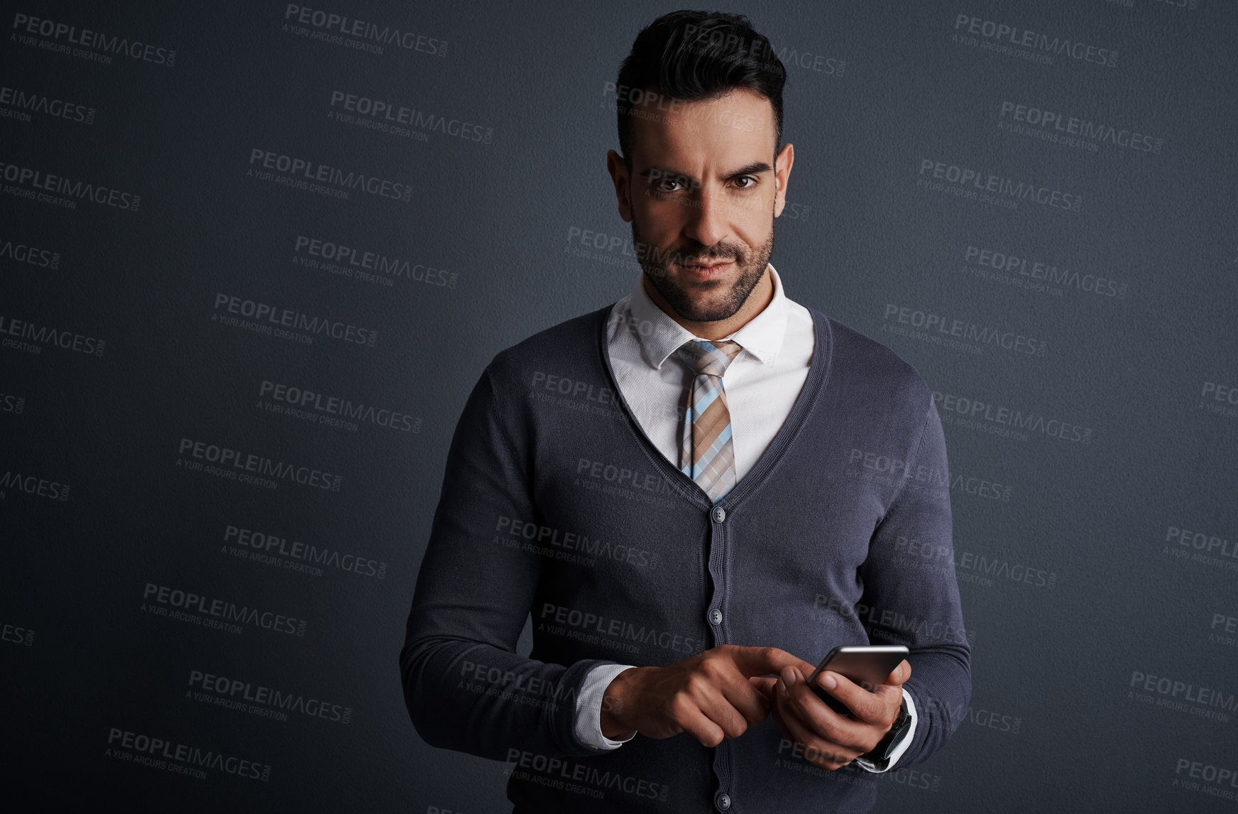 Buy stock photo Space, portrait and businessman in studio with phone for communication for finance report. Serious, technology and male financial advisor with cellphone for email on investment by gray background.