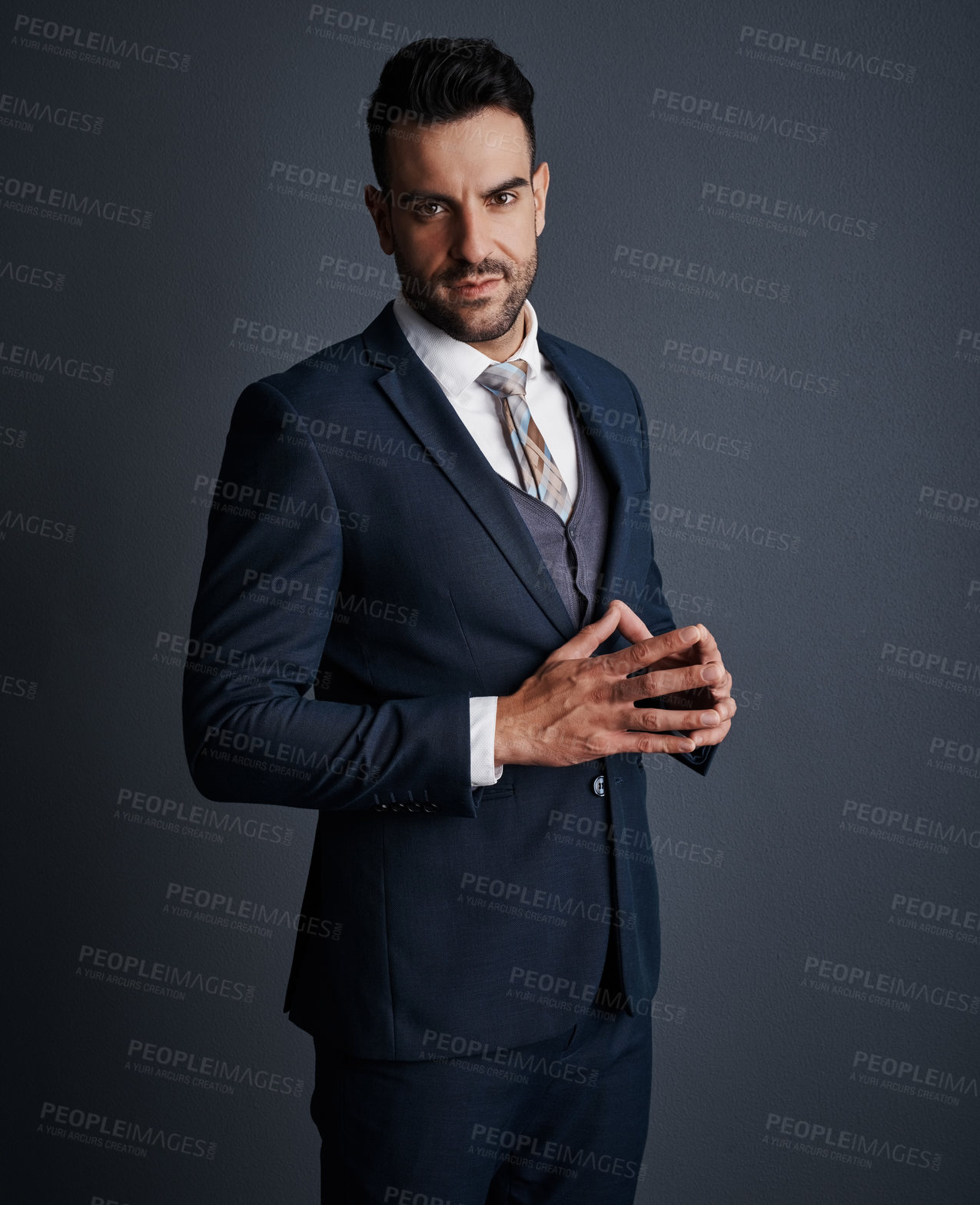 Buy stock photo Portrait, confidence and businessman in studio as corporate banker, about us and ambition. Finance worker, professional and person with career pride as investment expert on gray background in Spain