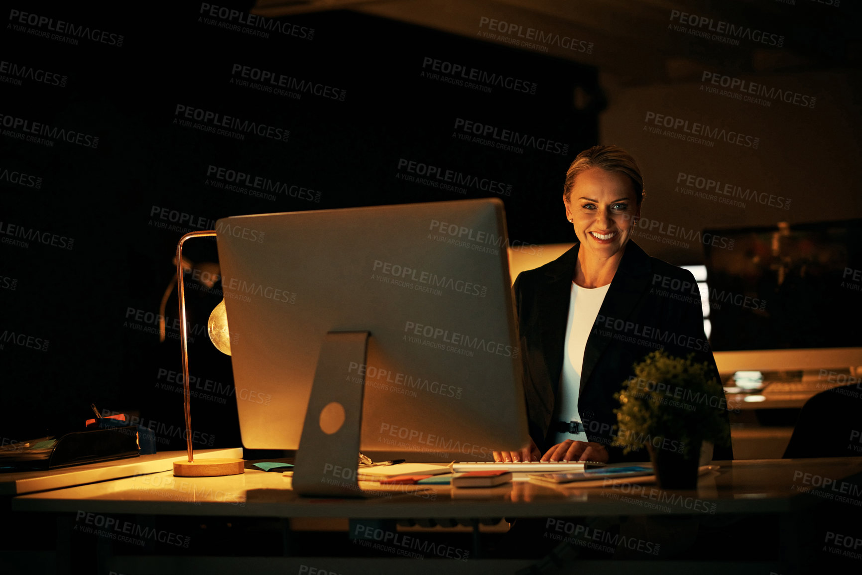 Buy stock photo Smile, woman and computer in office at night for lawyer career, about us and case preparation. Portrait, mature attorney and pc for legal research, review evidence and overtime with witness statement